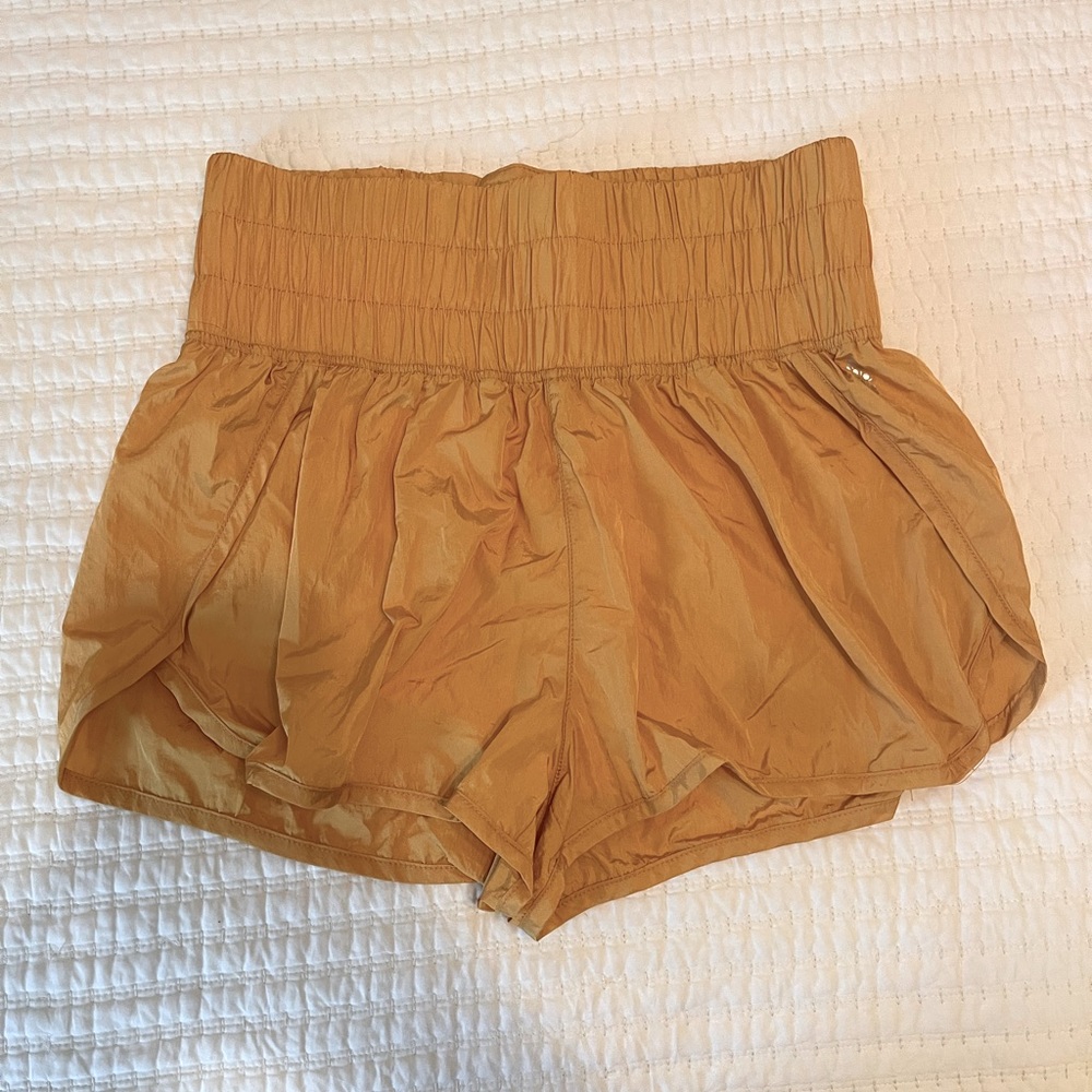 Gold athletic shorts, high waisted, size large
